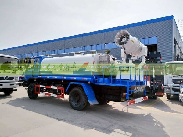 Green Sprinkler Truck