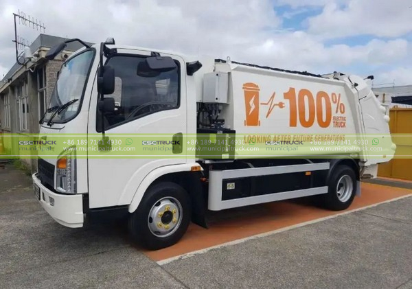 white rear loader compactor garbage truck